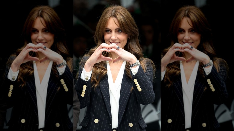 Kate Middleton making a heart symbol with her hands