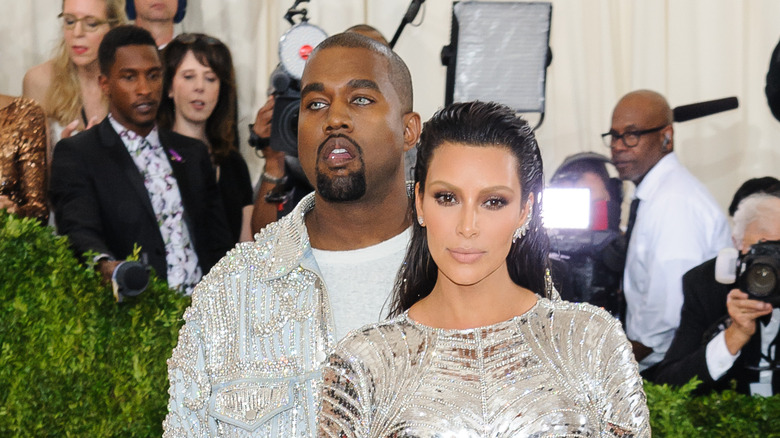 Kim Kardashian and Kanye West at an event.