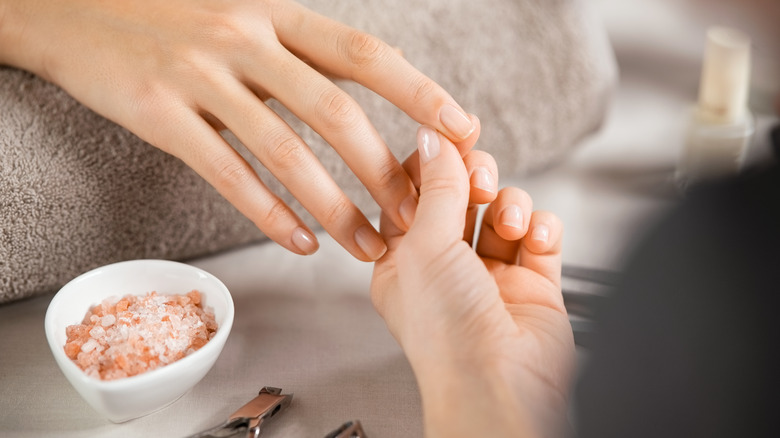 Woman getting a manicure