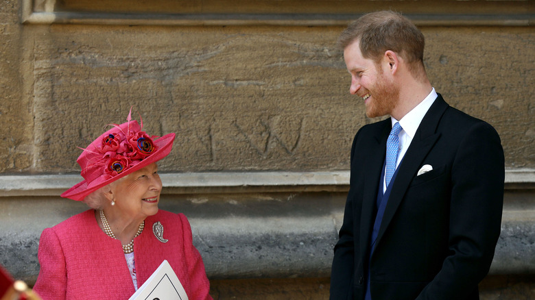 Prince Harry and Queen Elizabeth at an event.