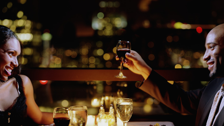 man and woman on dinner date