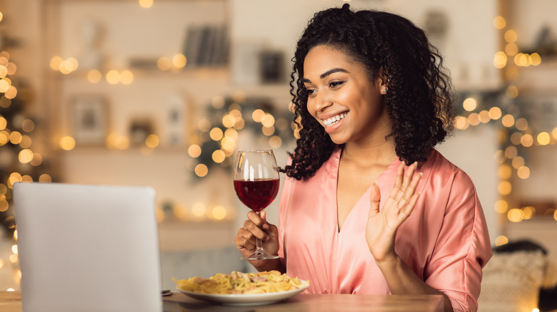 Woman enjoying dinner alone