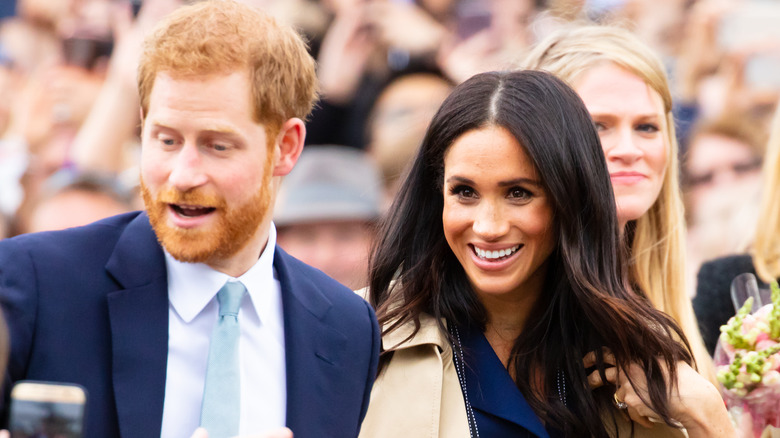 Prince Harry and Meghan Markle in crowd