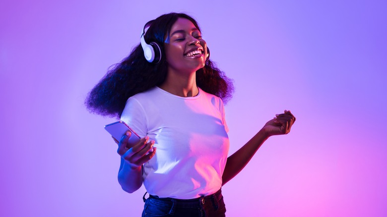 Smiling woman with headphones