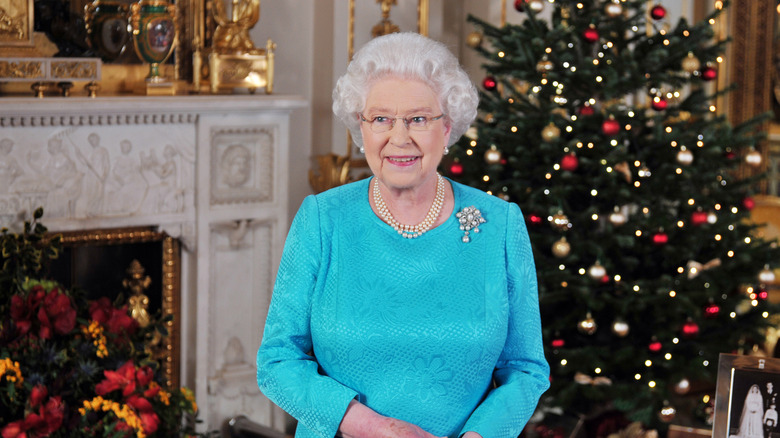 Queen Elizabeth smiles for a photo 