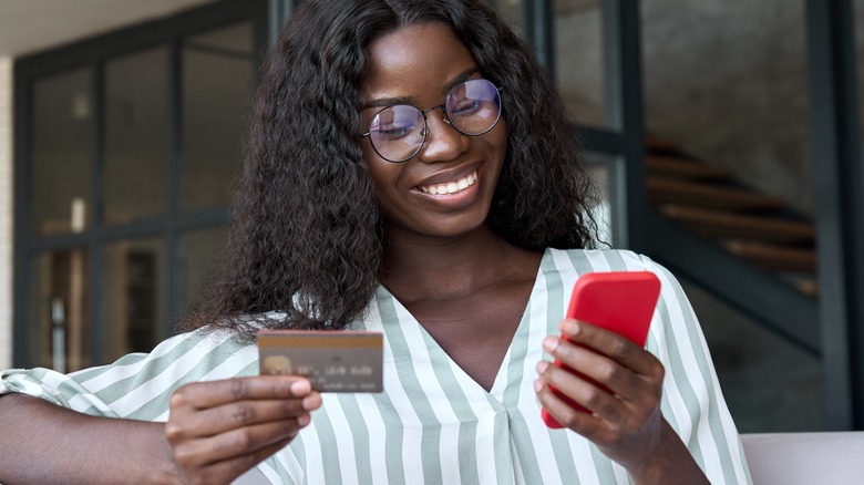 woman shopping online with phone