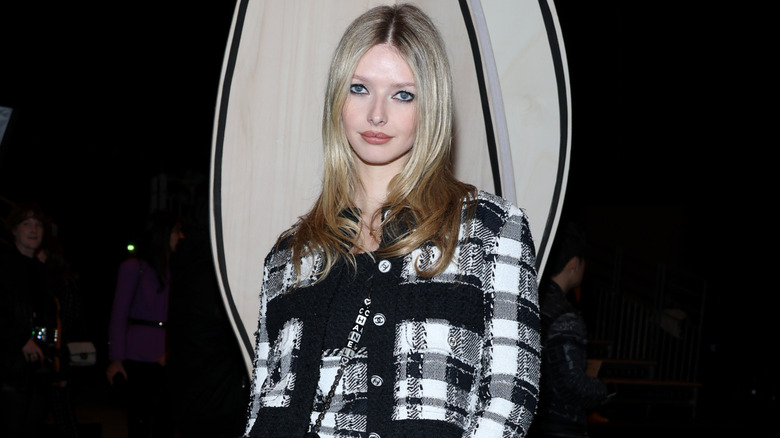 Apple Martin wearing plaid Chanel top