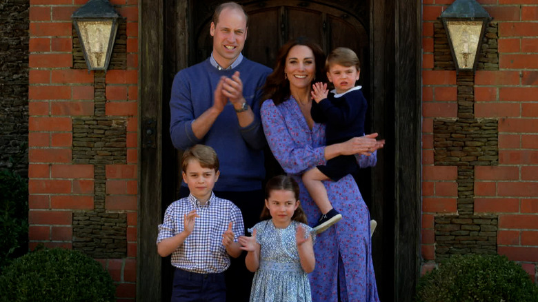 Prince William and Kate Middleton with their children.