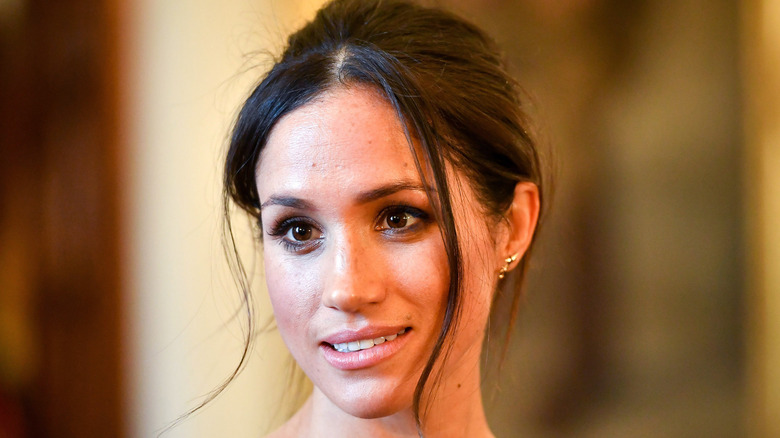 Meghan Markle smiling for photographers 