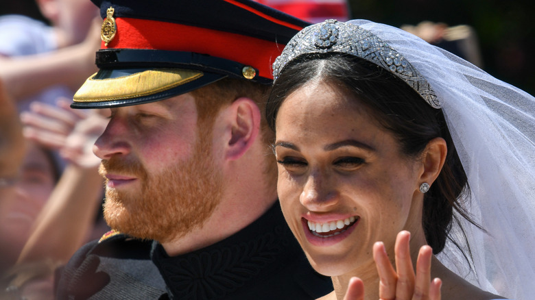 Prince Harry and Meghan Markle outdoors after wedding