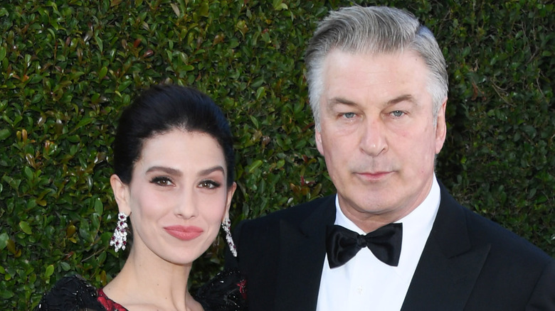 Alec and Hilaria Baldwin pose together at an event