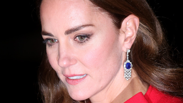 Kate Middleton looking down seriously