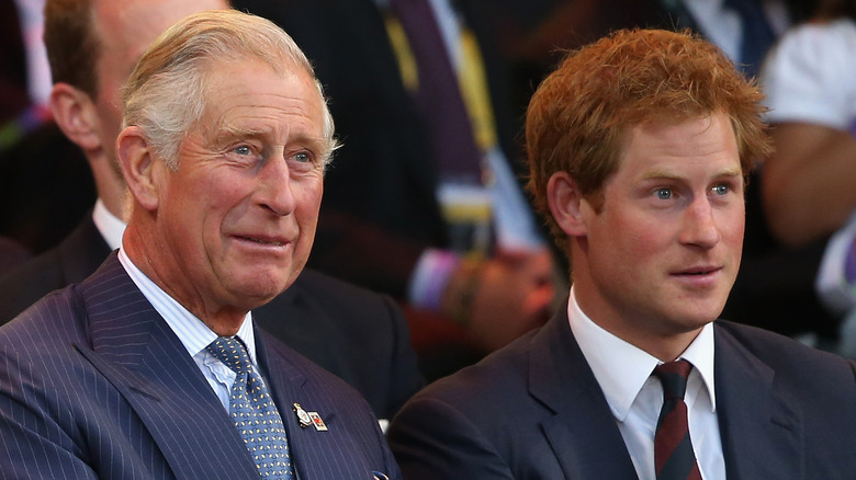 Prince Charles with Harry at an event