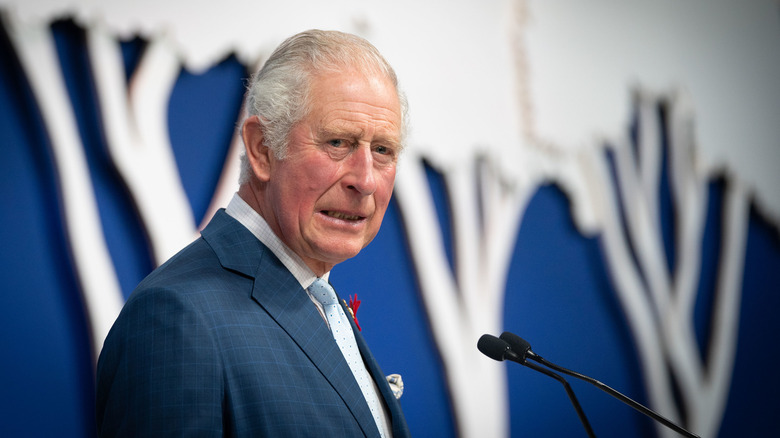 Prince Charles grimacing