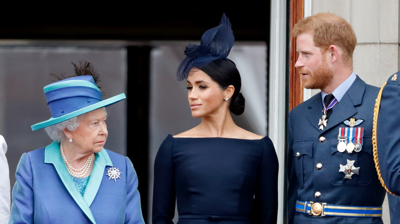 Prince Harry and Meghan Markle with Queen Elizabeth. 