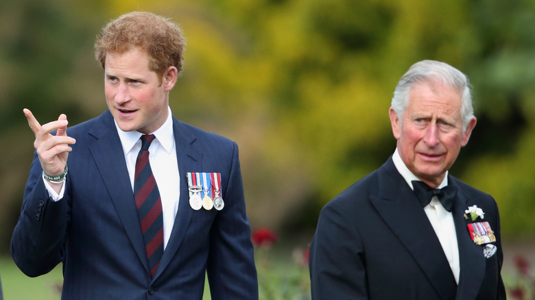 Prince Harry with his father Prince Charles. 