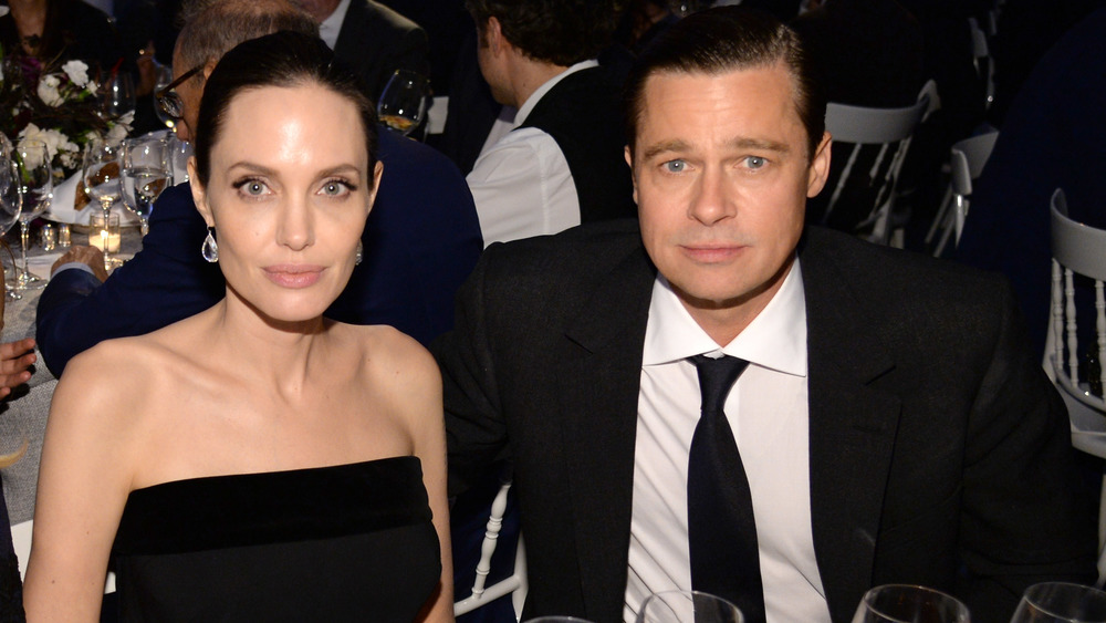 Brad Pitt and Angelina Jolie looking serious