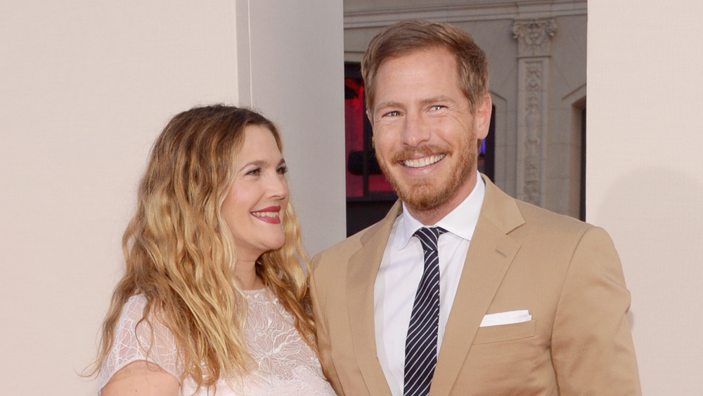 Drew Barrymore looking at Will Kopelman