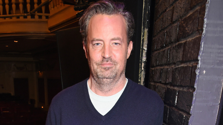 Matthew Perry poses for the camera in London.