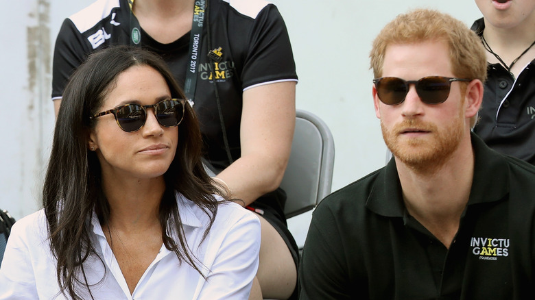 Prince Harry and Meghan Markle in sunglasses