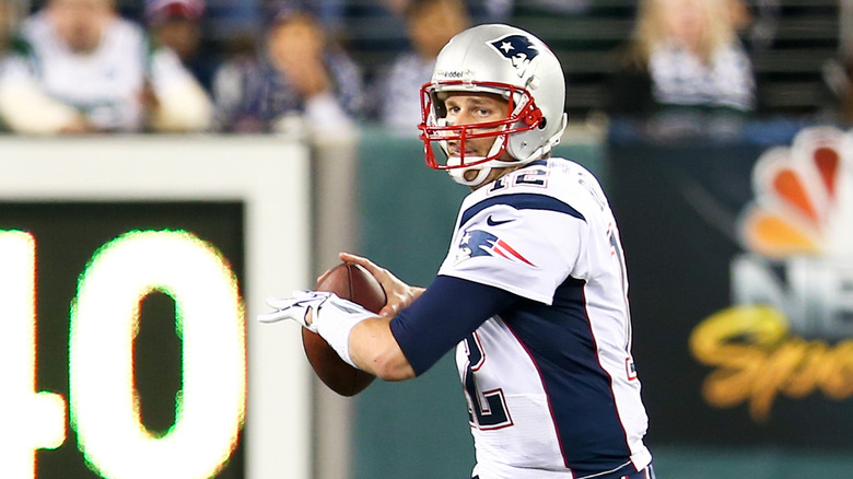 Tom Brady playing for the Patriots 