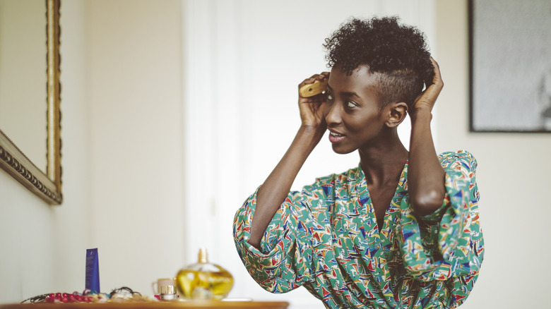 Woman brushing hair