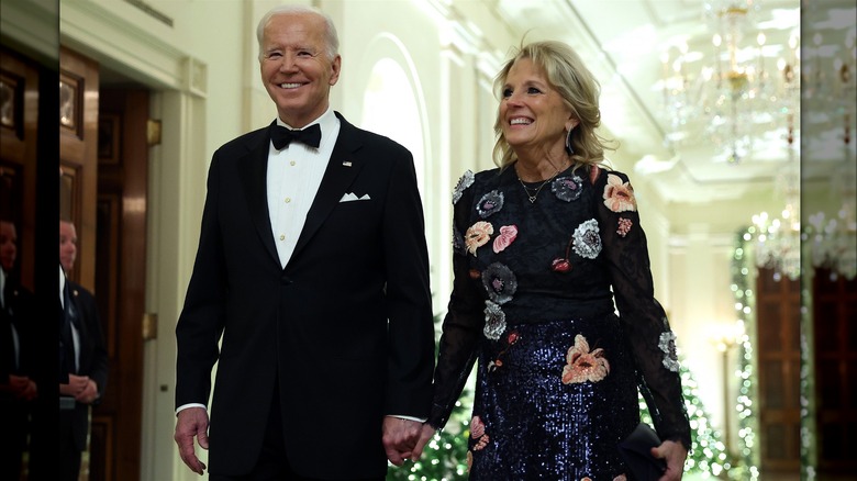 POTUS Joe Biden and FLOTUS Jill Biden holding hands