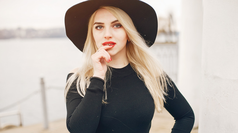 Woman wearing black dress