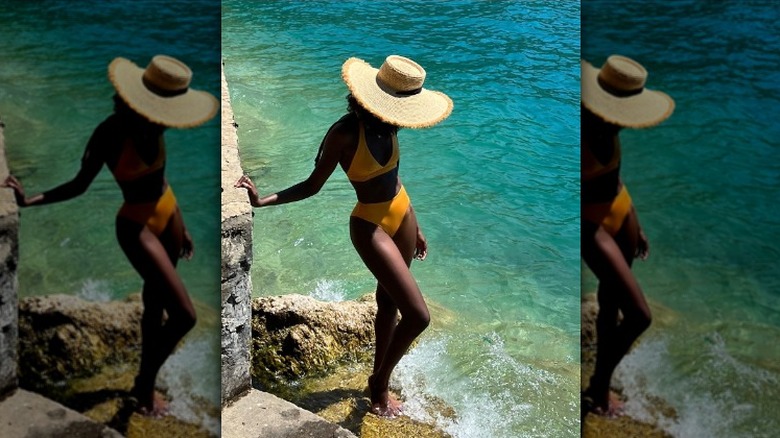 Woman on rocks at beach