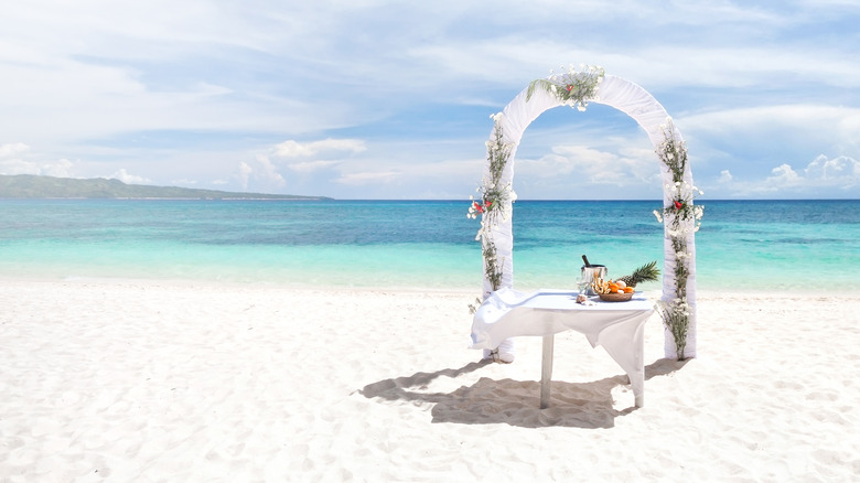 Wedding arbor in the sand at a beach