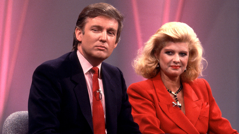 Donald Trump sitting next to Ivana Trump 