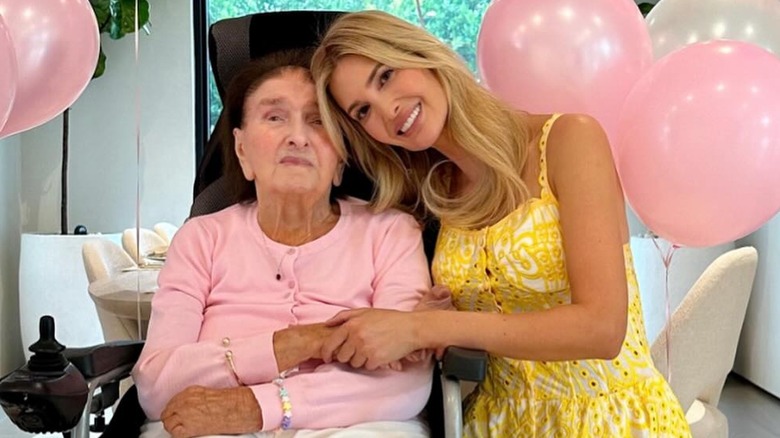 Ivanka Trump smiling and hugging her grandma