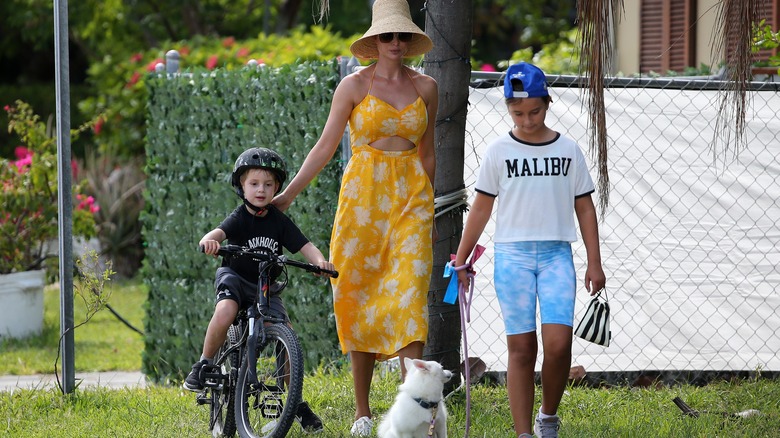 Ivanka Trump walking with two of her children