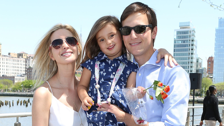 Ivanka Trump and Jared Kushner with Arabella Kushner attend the Born Free Africa Mother's Day Family Carnival at Hudson River Park Pier 45 in New York City (2014)