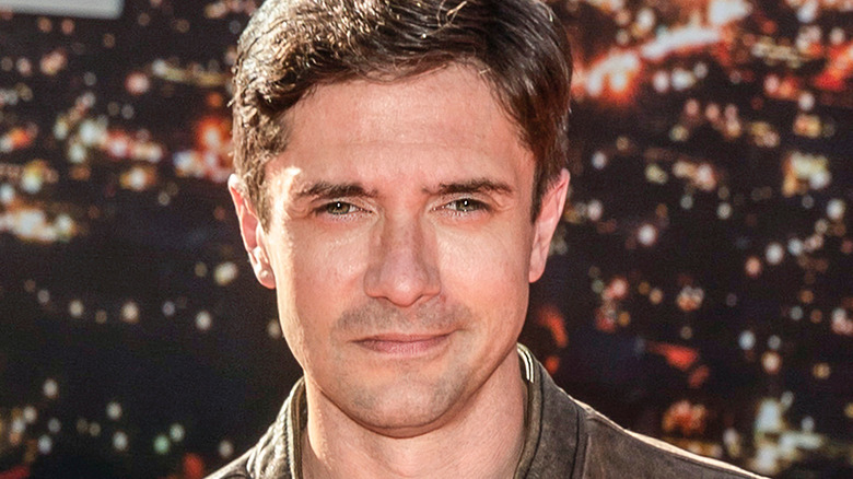 Topher Grace posing in 2019