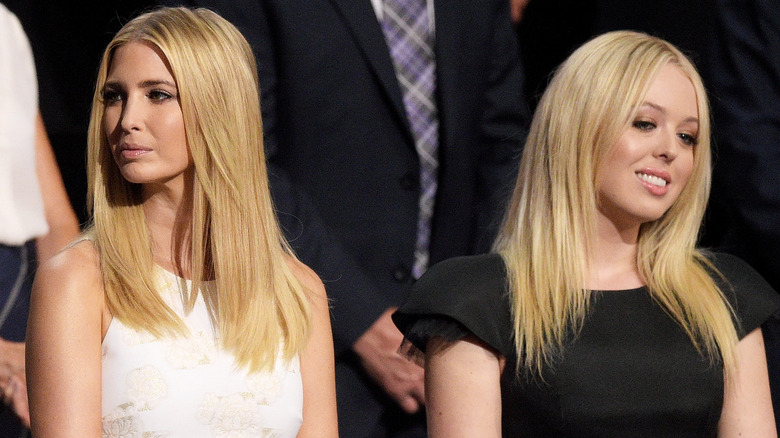 Ivanka and Tiffany Trump facing away from each other