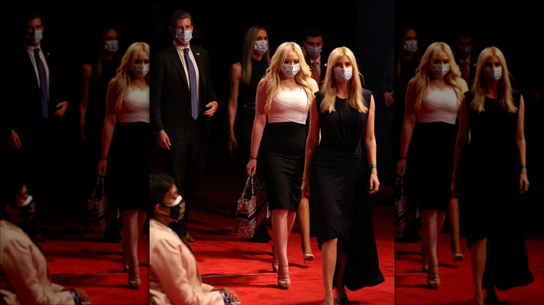 Ivanka and Tiffany Trump walking and wearing masks 