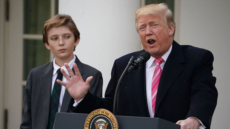 Barron Trump watching Donald Trump