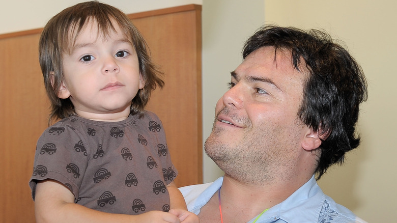 Jack Black looking at son