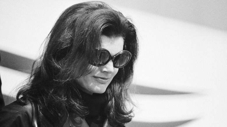 Jackie Kennedy wearing sunglasses