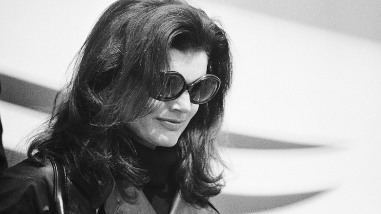 Jackie Kennedy looking down