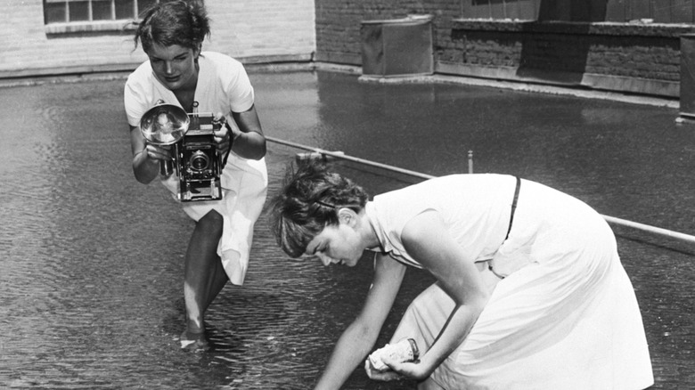 Jackie Kennedy working as a photographer reporter