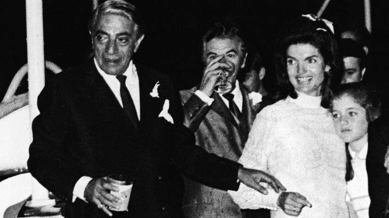 Aristotle Onassis and Jackie Kennedy in crowd