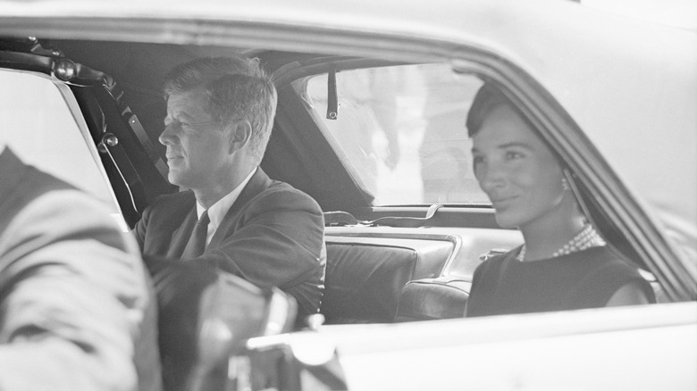 JFK and Lee Bouvier leaving hospital