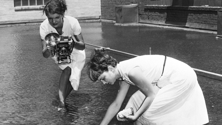 Jacqueline Bouvier taking a picture