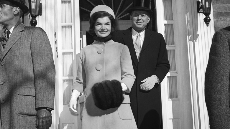 John and Jackie Kennedy sitting in a car