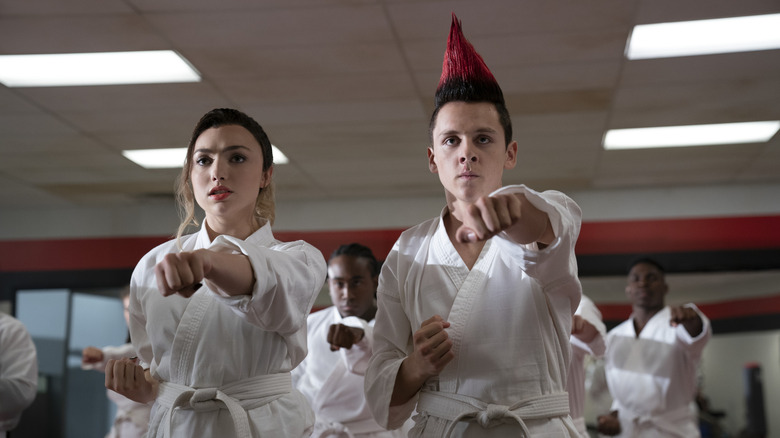 Peyton List and Jacob Bertrand in a scene from Cobra Kai
