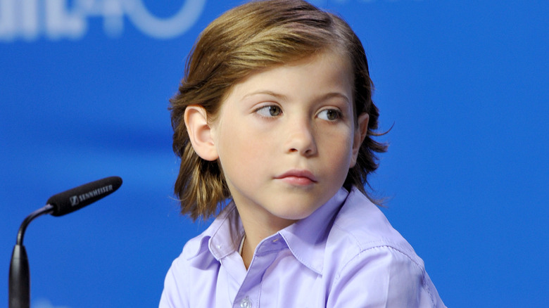 Jacob Tremblay at a microphone