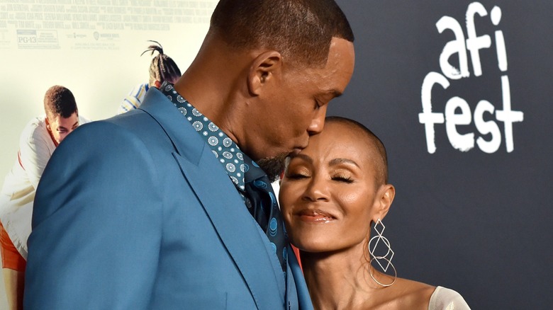 Will Smith kissing Jada Pinkett Smith