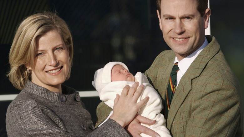 James and Sophie, Duke and Duchess of Edinburgh, holding baby James